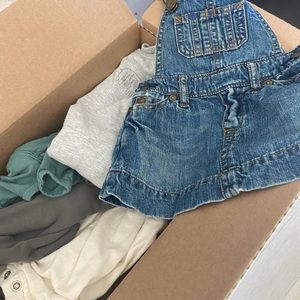 Box of baby clothes MH